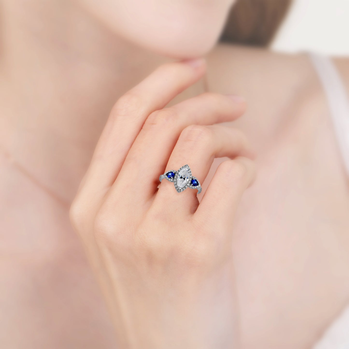 Marquise Zirconia Sapphire Halo Engagement Ring